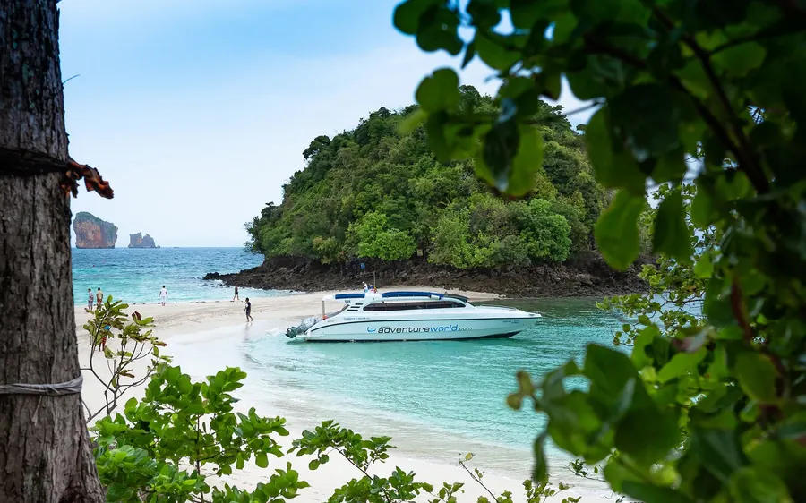 An early morning speedboat leaving Phuket for the Krabi islands